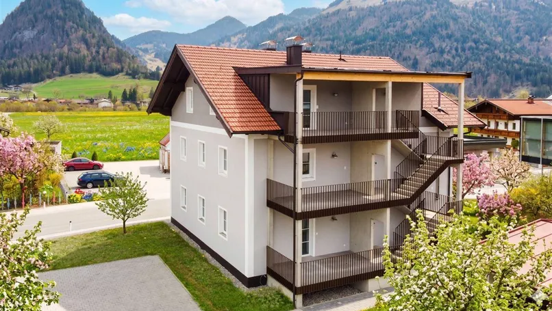 Wohnhaus mit drei Eigentumswohnungen in Kössen am Wilden Kaiser